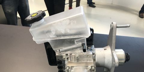 This master cylinder prototype for ZF's electric brake-assist system replaces the conventional vacuum booster with an electric motor.