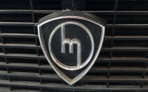 This old logo came around right when Mazda decided to start selling cars. Before 1963 it made three-wheeled trucks.