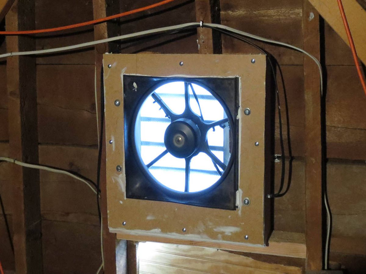 Using cheap junkyard car parts make a solar-powered attic ventilator