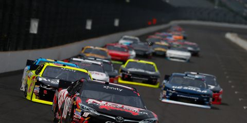 Kyle Busch leads a pack of cars during the NASCAR Xfinity Series Lilly Diabetes 250 on Saturday afternoon.