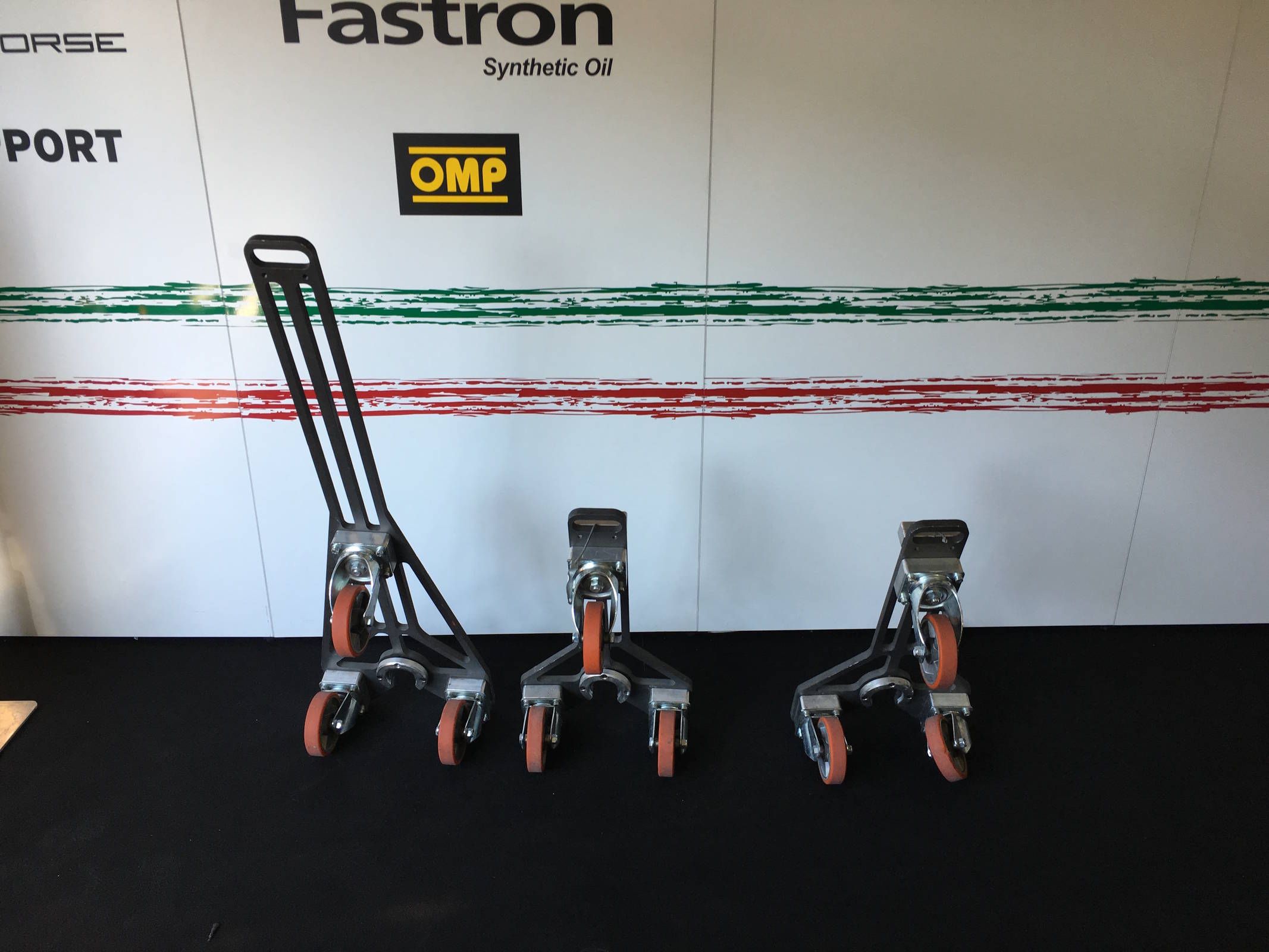 The Lamborghini Huracan GT3 Evo's jack stands when not in use. The long one goes under the center of the front of the car; the remaining two slide under either side of the back.