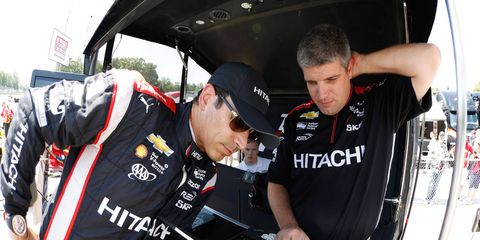 Something always seems to go wrong for Helio Castroneves, left, and Team Penske at Iowa Speedway.