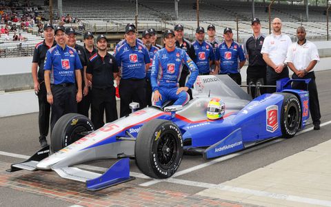 The money shot for every driver who aspires to race at Indianapolis. This one is of Justin Wilson and crew after qualifying in May.