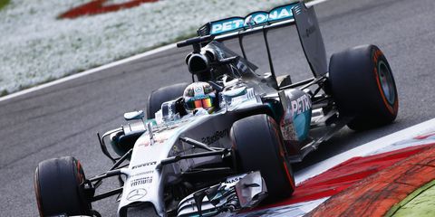 Lewis Hamilton closed the championship gap on teammate Nico Rosberg with a victory in the Formula One Italian Grand Prix on Sunday.