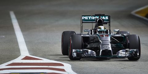 Lewis Hamilton held off the Red Bull Racing machines of Sebastian Vettel and Daniel Ricciardo in Singapore on Sunday.