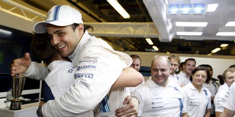 Felipe Massa celebrates his runner-up finish at Abu Dhabi in the final race of the 2014 Formula One season.