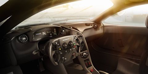 From the cockpit of a McLaren P1 GTR, the entirety of creation is suffused by a rich golden light.