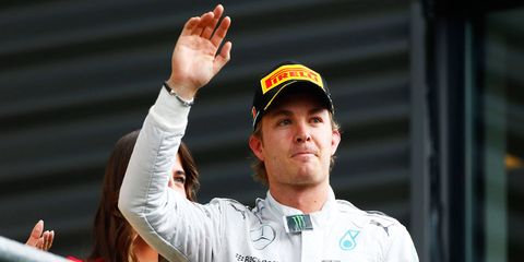 Nico Rosberg waves to the crowd from the victory podium at Spa on Aug. 24.