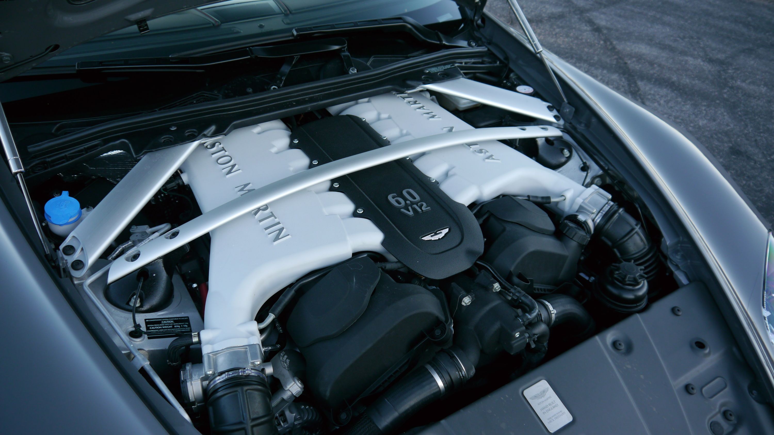 The 6-liter V12 engine in the Aston Martin Vantage S Roadster develops 565 hp and 457 lb-ft of torque