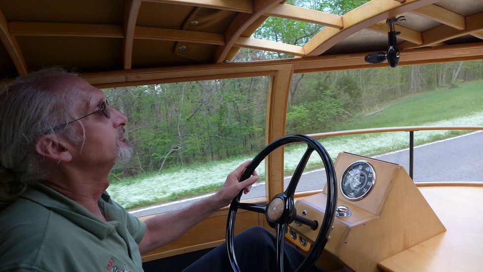 Lane Motor Museum director Jeff Lane at the helm. Lane understands the importance of the Dymaxion car, flaws and all.