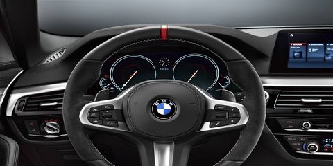 This BMW 5-Series steering wheel has leather coverings on the top and bottom, but softer Alcantara on the sides.