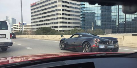 No, your eyes are not deceiving you. That is a Pagani Huayra with Montana plates spotted rolling into Houston.