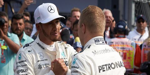 Lewis Hamilton -- with some nudging from his Mercedes bosses -- may consider helping teammate Valtteri Bottas, right, over the final two races of the season as Bottas battles Sebastian Vettel for second place in the drivers' standings.