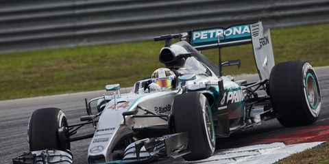 Lewis Hamilton took the pole for Sunday's Formula One race in Malaysia.