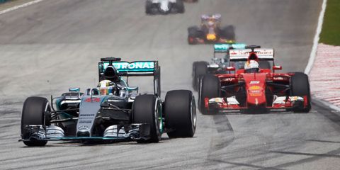 Lewis Hamilton (44) hopes to hold off the challenge of Ferrari's Sebastian Vettel this weekend in China.