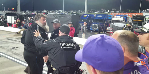 A fan confronted NASCAR driver Denny Hamlin after the First Data 500 at Martinsville Speedway.
