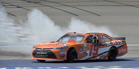 Daniel Suarez passed Kyle Busch with one lap to go to record his first NASCAR Xfinity series win.
