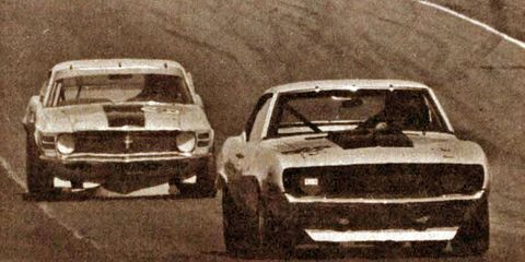 Milt Minter's ARA Camaro leads George Follmer's Bud Moore Mustang.
