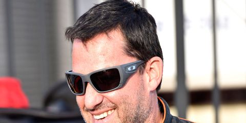 Tony Stewart raced and won in a sprint car at a short track in Michigan on Friday.