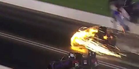 Robert Hight's Funny Car, top, exploded on Saturday night.