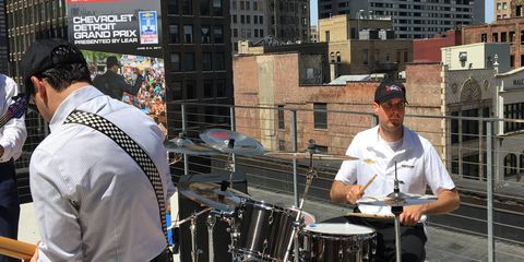 Team Penske IndyCar driver Will Power took time out from a media stop for a little jam session on a rooftop in Detroit on Wednesday.