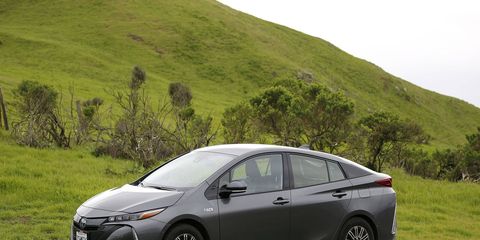 Unseasonably late rains in California made the Sonoma Raceway hills as green as the Prius' public image.