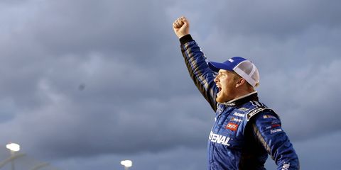 Chris Buescher celebrates at Homestead-Miami Speedway on Saturday after clinching the NASCAR Xfinity Series championship.