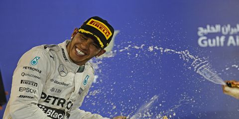Lewis Hamilton celebrates after winning in Bahrain.