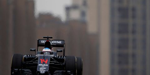 McLaren-Honda driver Fernando Alonso runs practice laps in China.