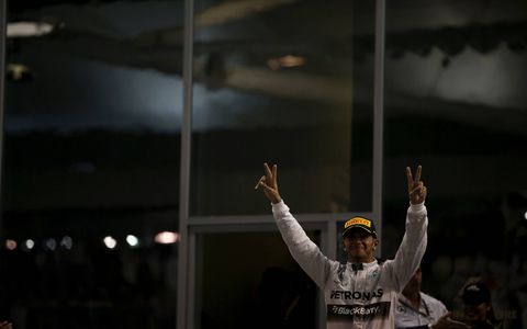 Lewis Hamilton celebrates.