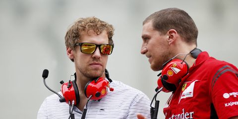Sebastian Vettel watches Abu Dhabi testing with Ferrari.