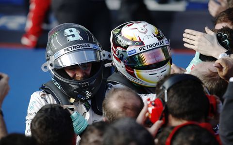 Lewis Hamilton and Mercedes teammate Nico Rosberg celebrate after a one-two finish in Melbourne.