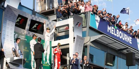 Nico Rosberg celebrates on the top step of the podium last year at Melbourne.