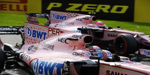 Sergio Perez leads Force India teammate Esteban Ocon shortly before the pair made contact with each other.