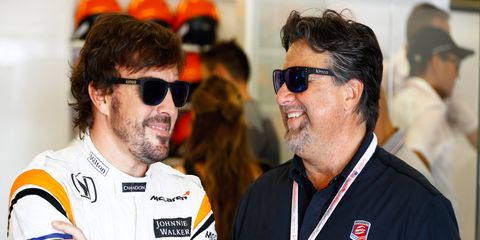 Fernando Alonso, left, and Michael Andretti chat at the U.S. Grand Prix in Austin in October.
