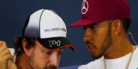 McLaren Honda's Fernando Alonso, left, and Mercedes' Lewis Hamilton have combined for five Formula 1 world titles.