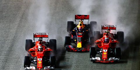 Sebastian Vettel, left, Max Verstappen and Kimi Raikkonen were each collected in a first-corner crash in Singapore.
