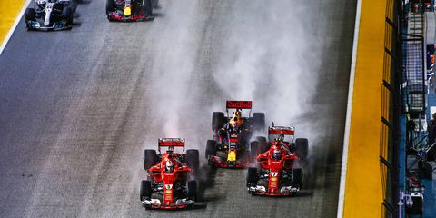 Sebastian Vettel, Max Verstappen and Kimi Räikkönen crashed on the opening lap of the Singapore Grand Prix Sunday.