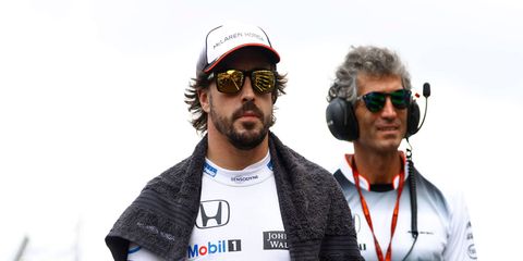 Fernando Alonso, left, says he'd hate to see the Formula 1 series expand beyond its current 21-race slate.