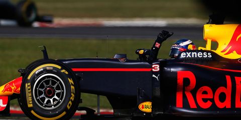 Daniel Ricciardo takes the checkered flag for Red Bull Racing in Malaysia.