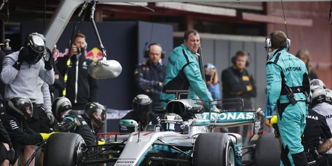 Valtteri Bottas does a practice pit stop in his Mercedes F1 W08.