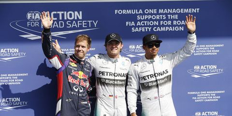Nico Rosberg (center), Lewis Hamilton (right) and Sebastian Vettel (left), were the top three qualifiers for the Belgian Grand Prix. The three took part in a press conference after qualifying.
