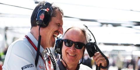 Haas F1 Team principal Guenther Steiner, left, and team owner Gene Haas were all smiles in Australia last Sunday as driver Romain Grosjean finished sixth.
