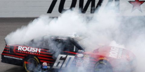 Chris Buescher outran the field to win the NASCAR Xfinity Series race at Iowa Speedway on Sunday.