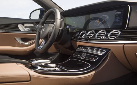 High-quality materials define the E-Class' interior, including leather and natural grain ash with flowing lines.