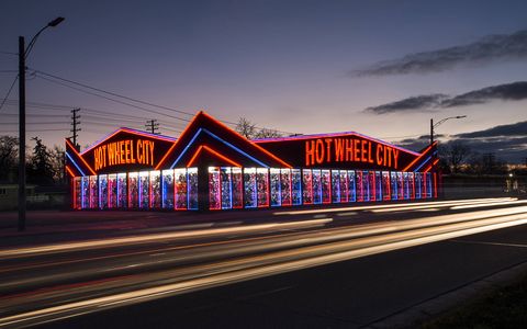 Hot Wheel City's neon lights help make it one of Eight Mile Road's well-known stops.