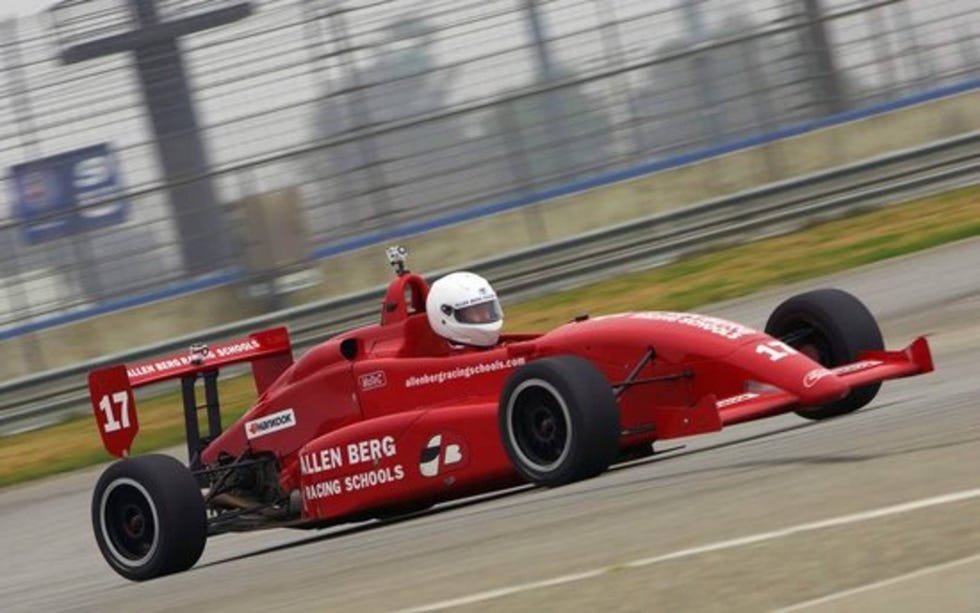 Tire, Wheel, Automotive tire, Automotive design, Open-wheel car, Vehicle, Race track, Automotive wheel system, Sport venue, Formula one tyres, 