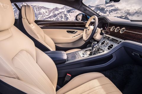 The interior of the 2019 Bentley Continental GT is as plush -- and as silent -- as you'd expect in one of the marque's grand tourers. To make it even more relaxing, the push of a button makes the central infotainment screen disappear.