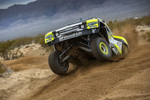 The Rocket Mototrsports Trophy Truck, driven by Jenson Button, among others, bashes its way through the desert during the last Mint 400.