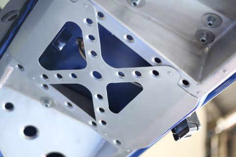 The C-HR R-Tuned maintains all the stock Toyota sheet metal except the carbon fiber hood, but every other detail is tuned for performance. And no, you can't buy one. Here is some Motorsports Technical Center custom hatch bracing.